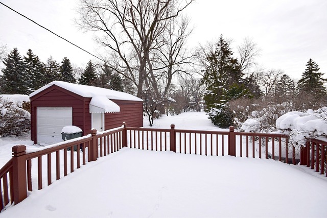489 Uvedale Road Riverside, IL 60546 - Photo 20 of 25 a view of a wooden fence
