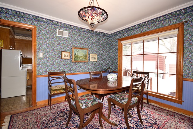 489 Uvedale Road Riverside, IL 60546 - Photo 6 of 25 a dining room with furniture and window