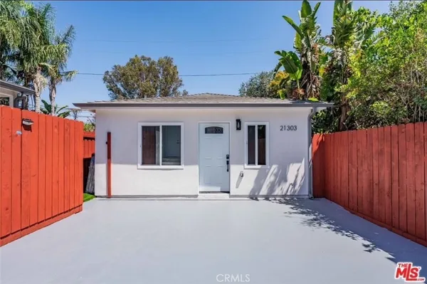 a front view of a house with a garage