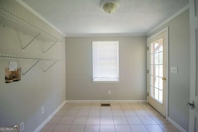 an empty room with windows