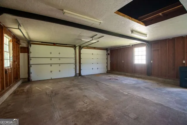 a view of backyard with green space