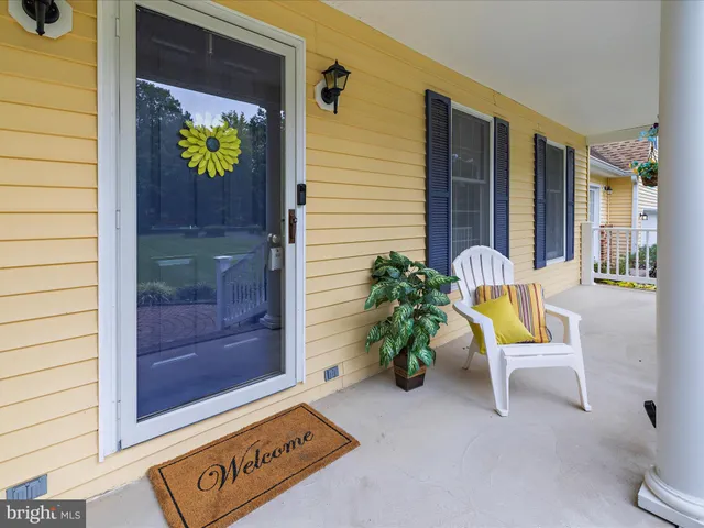 a view of a hallway with an entryway
