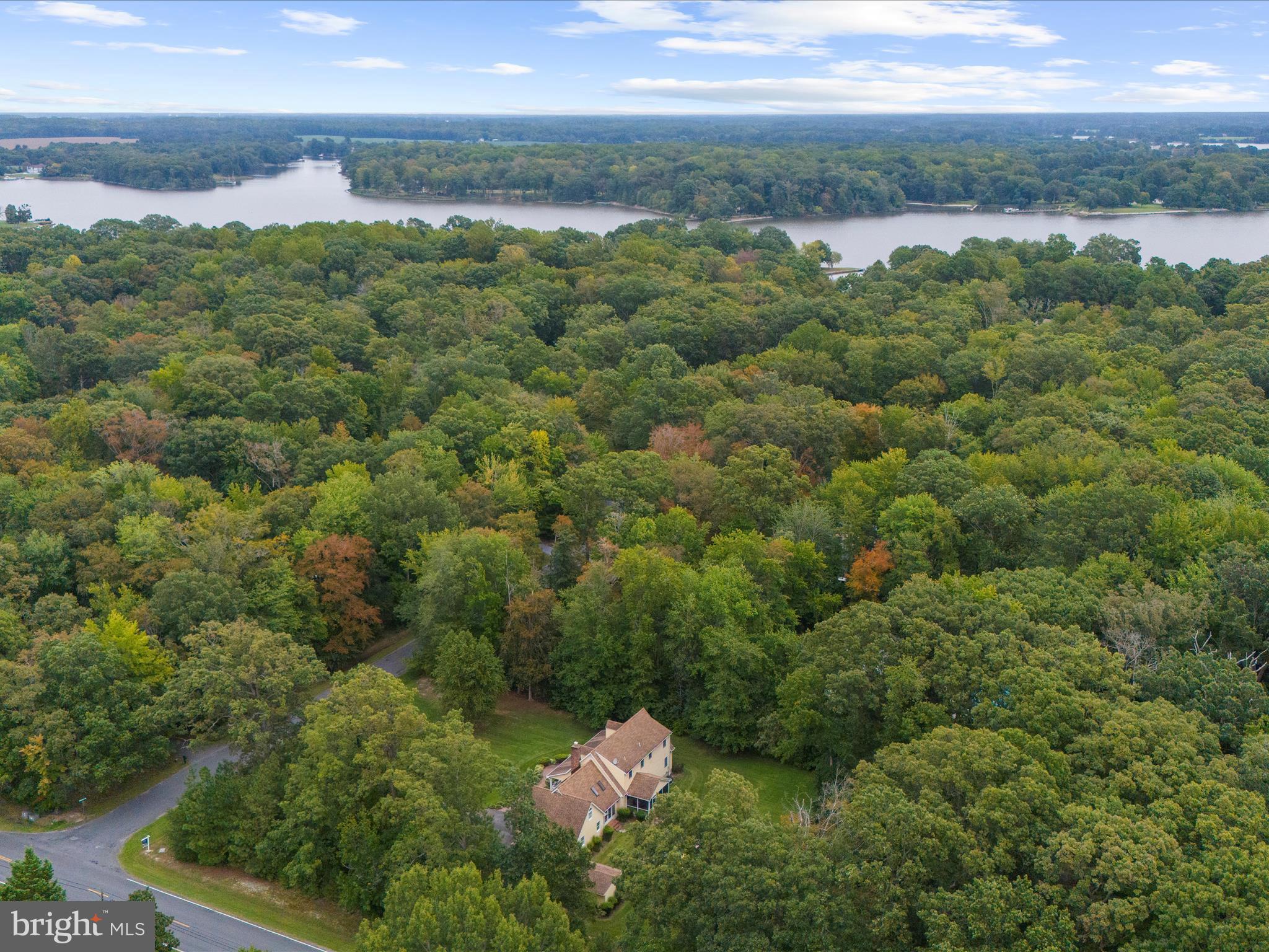 100 Marlborough Road Queenstown, MD 21658 - Photo 70 of 83 a view of a lake with a yard