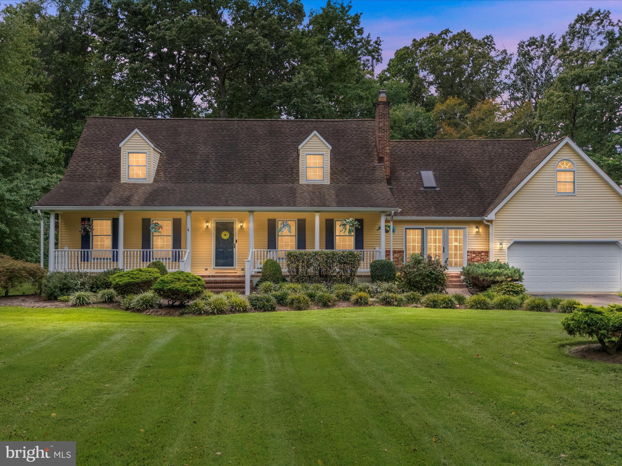 100 Marlborough Road Queenstown, MD 21658 - Photo 10 of 83 a front view of a house with a yard