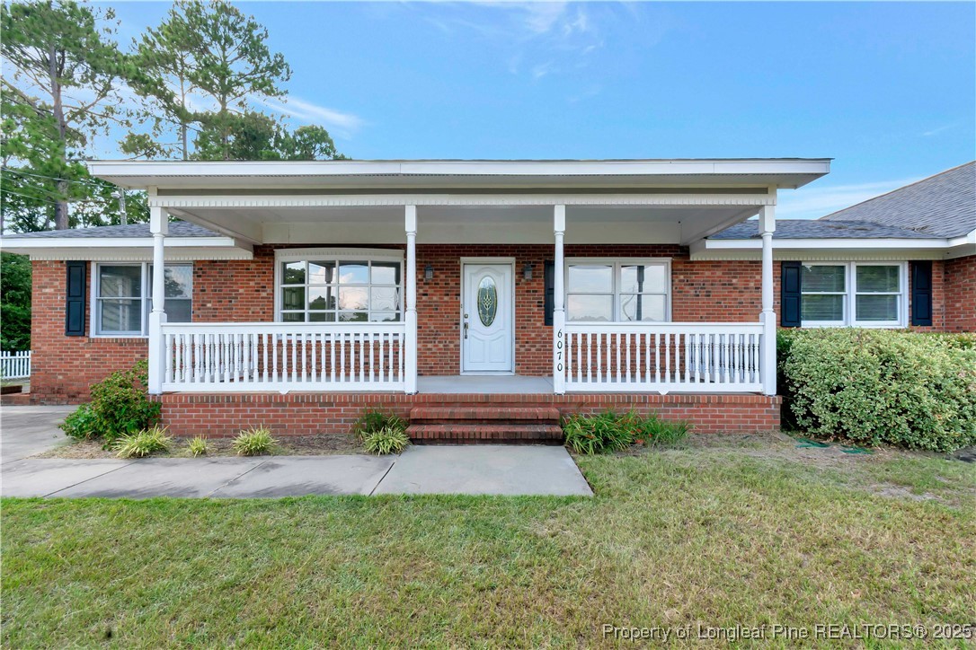 6036-6070 Camden Road Fayetteville, NC 28306 - Photo 5 of 45 front view of a house