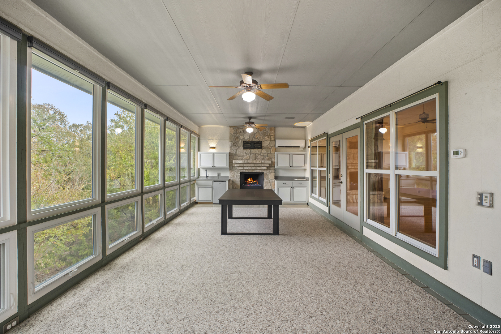1245 Phantom Rider Trail Spring Branch, TX 78070 - Photo 12 of 48 wooden floor in an empty room with a window