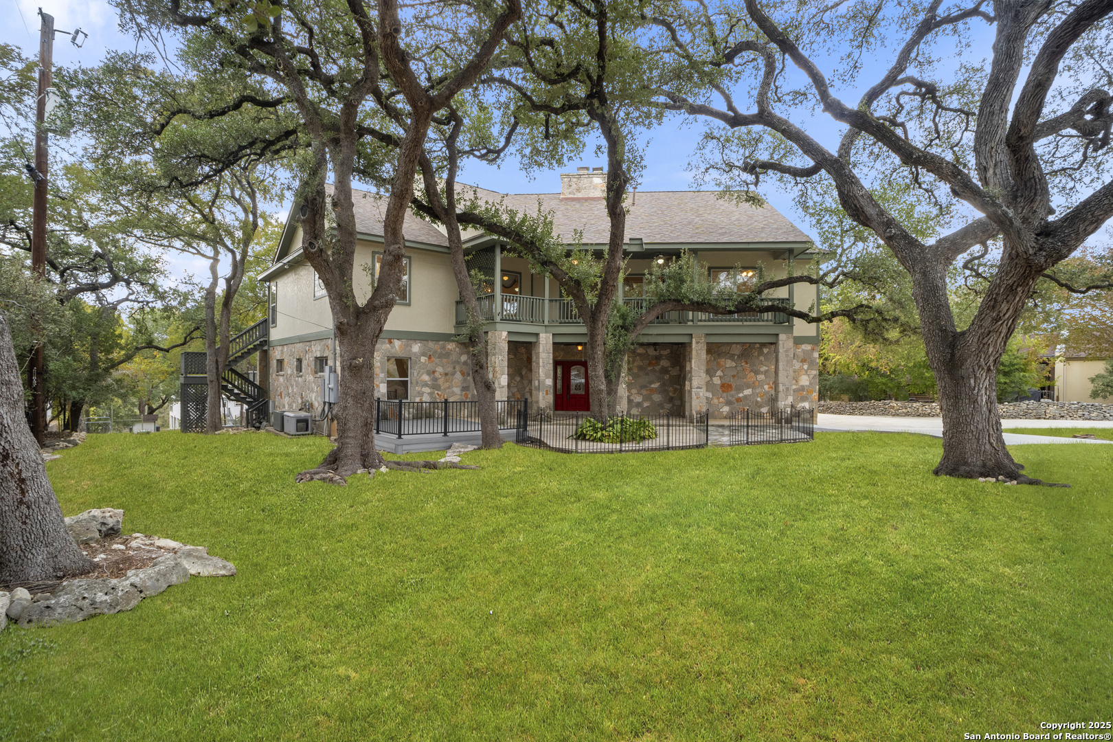 1245 Phantom Rider Trail Spring Branch, TX 78070 - Photo 22 of 51 a view of a house with a yard
