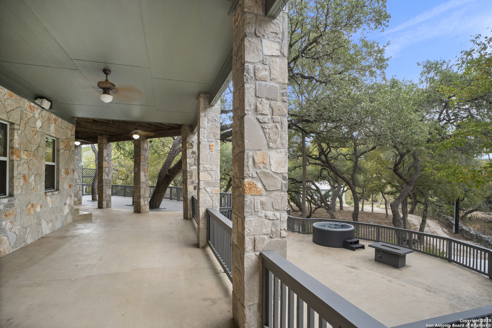 1245 Phantom Rider Trail Spring Branch, TX 78070 - Photo 22 of 48 a view of lobby with furniture and floor to ceiling window