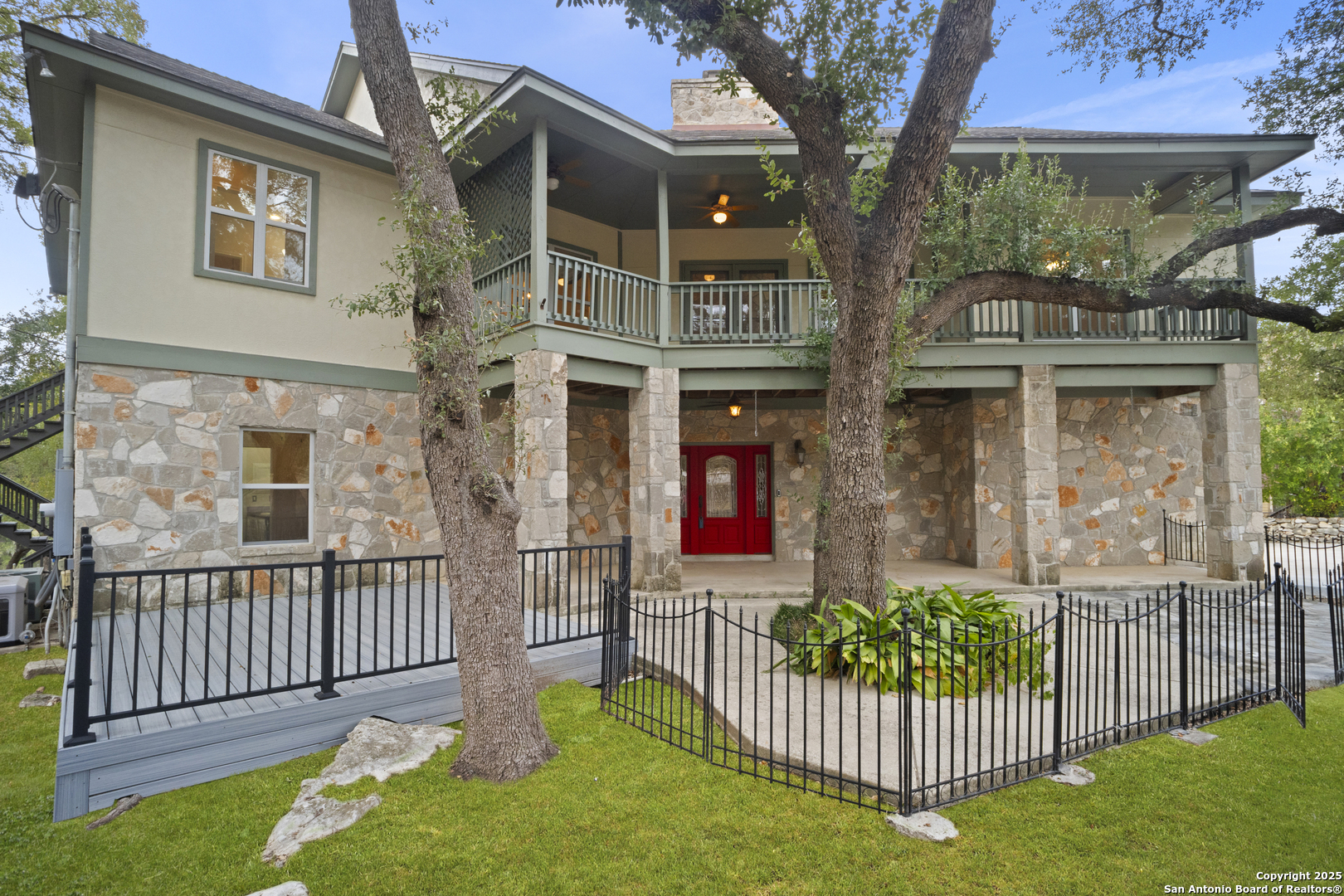 1245 Phantom Rider Trail Spring Branch, TX 78070 - Photo 23 of 51 front view of a house with a yard