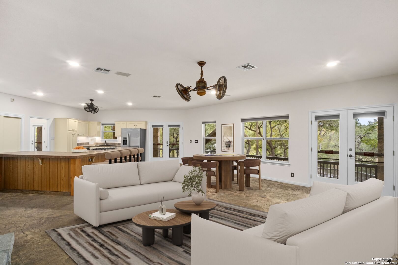 1245 Phantom Rider Trail Spring Branch, TX 78070 - Photo 38 of 51 a living room with furniture and a large window