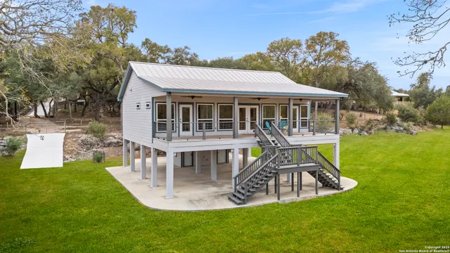 a view of balcony with wooden floor
