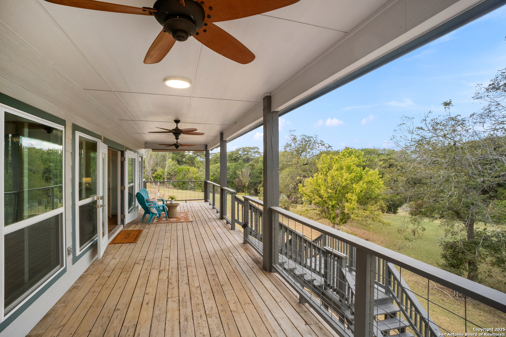 1245 Phantom Rider Trail Spring Branch, TX 78070 - Photo 7 of 51 a view of balcony with wooden floor
