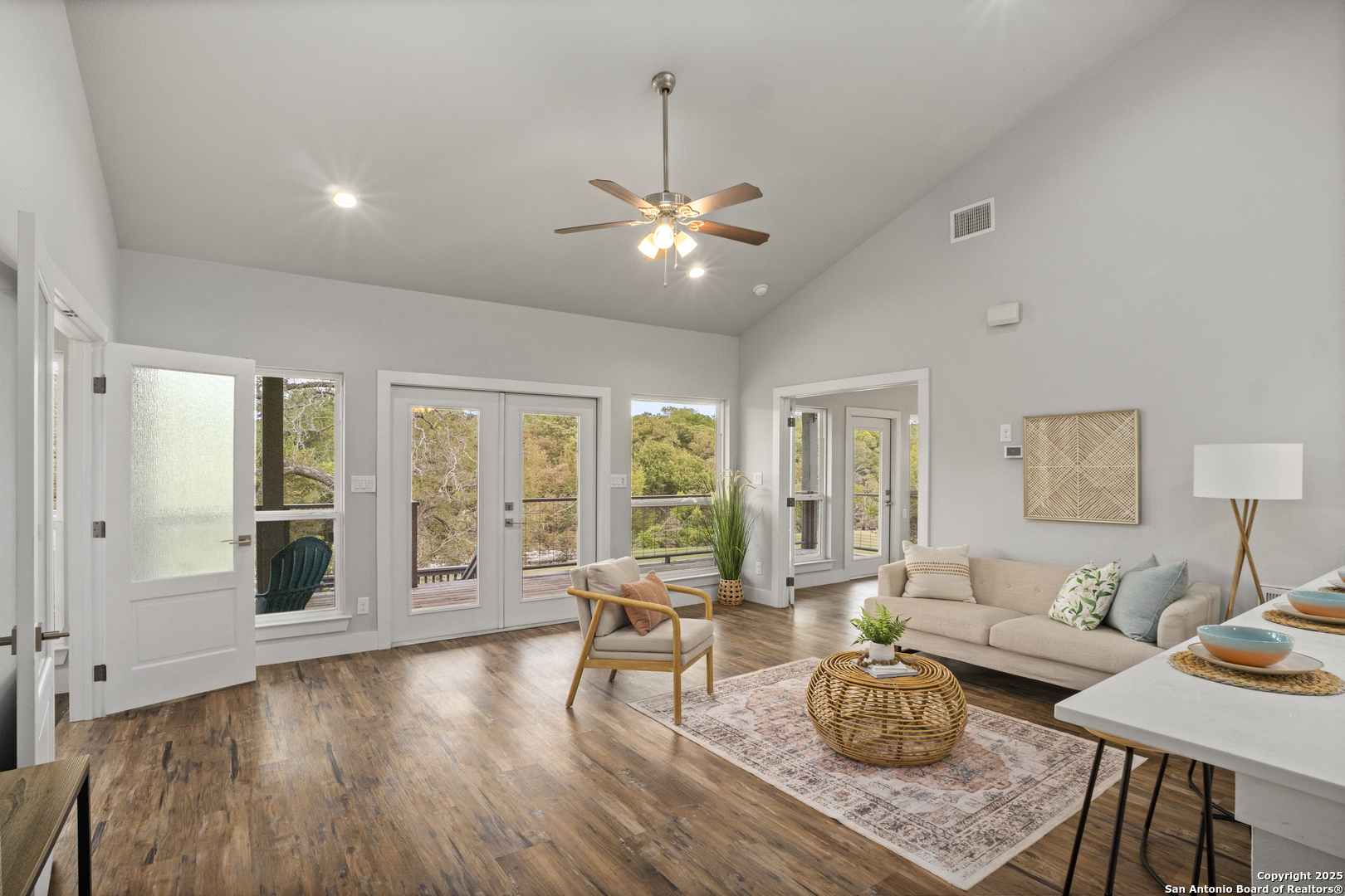 1245 Phantom Rider Trail Spring Branch, TX 78070 - Photo 8 of 51 a living room with furniture and a chandelier