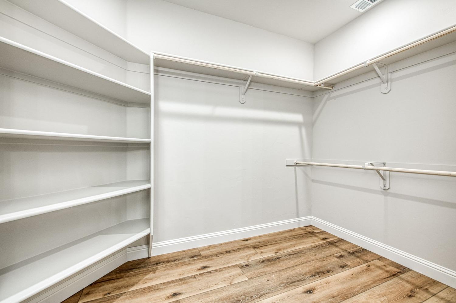 11271 Mountain View Drive Madera, CA 93636 - Photo 13 of 73 a view of a room with wooden floor