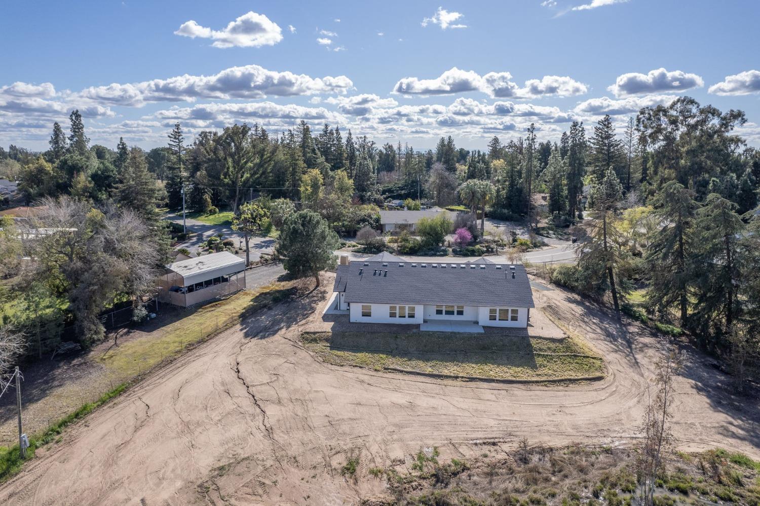 11271 Mountain View Drive Madera, CA 93636 - Photo 15 of 73 a view of a water fountain in front of the house