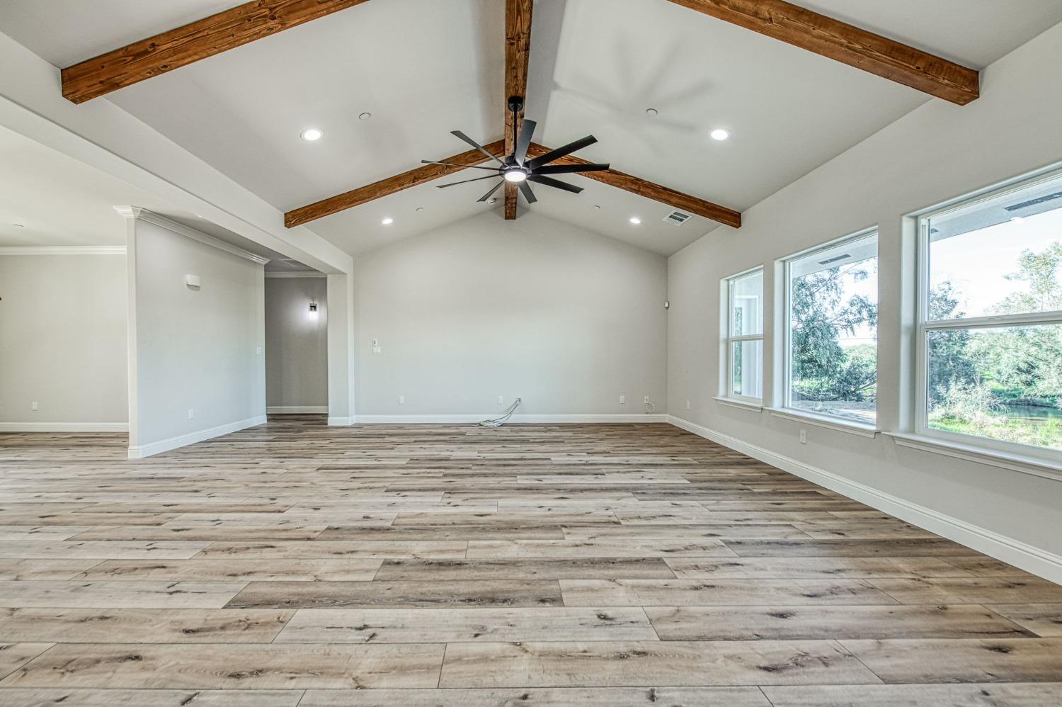 11271 Mountain View Drive Madera, CA 93636 - Photo 28 of 73 a view of a livingroom with a ceiling fan and window