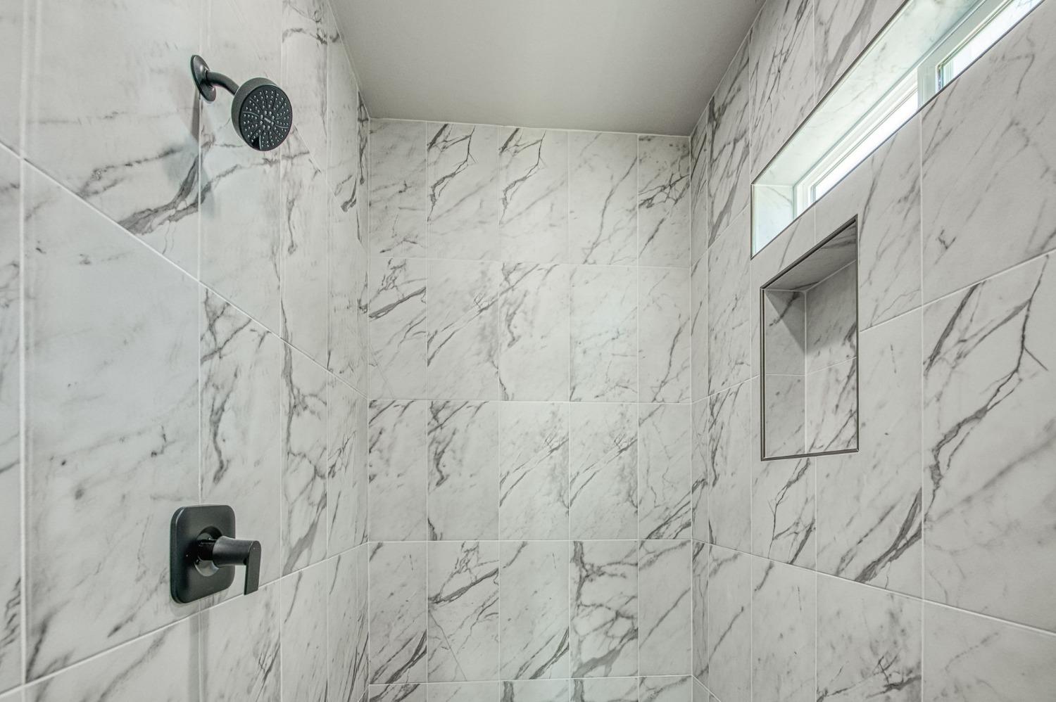 11271 Mountain View Drive Madera, CA 93636 - Photo 46 of 73 a bathroom with a shower