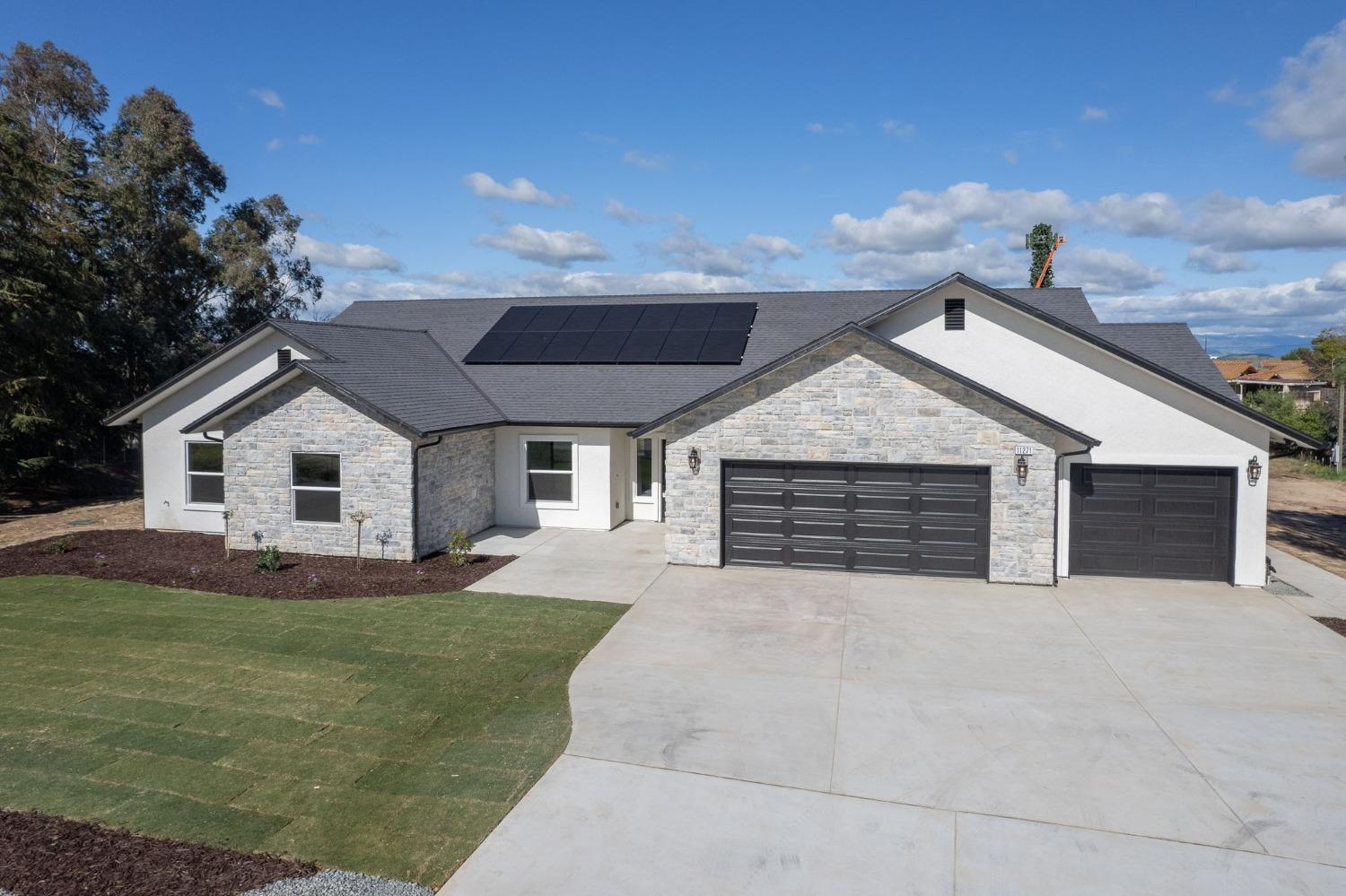 11271 Mountain View Drive Madera, CA 93636 - Photo 54 of 73 a view of house with yard and a trees
