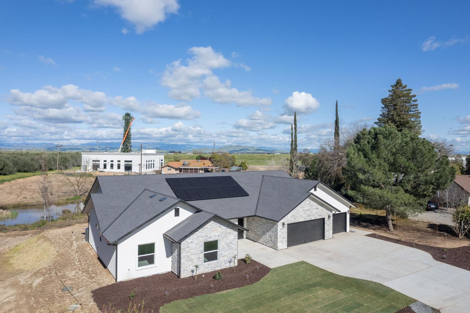 11271 Mountain View Drive Madera, CA 93636 - Photo 56 of 73 a aerial view of a house with a yard
