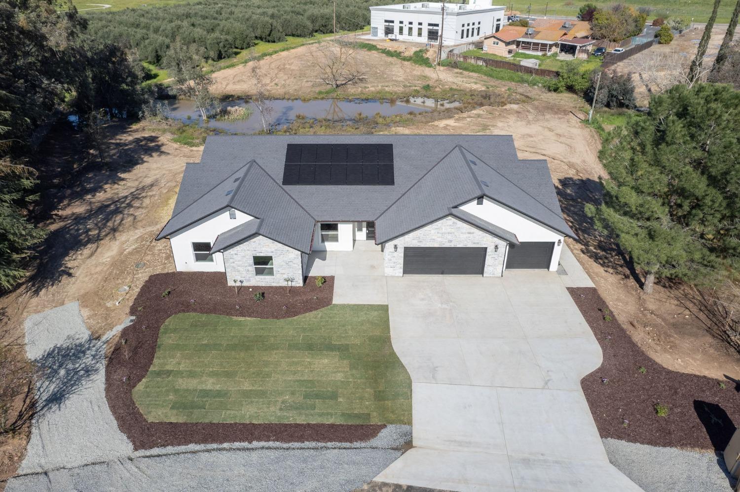 11271 Mountain View Drive Madera, CA 93636 - Photo 57 of 73 an aerial view of a house with a yard