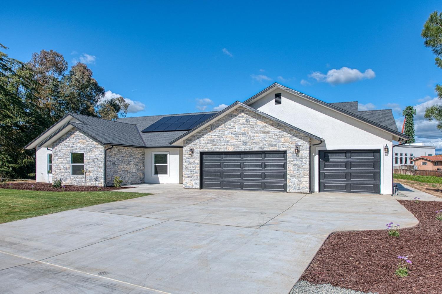 11271 Mountain View Drive Madera, CA 93636 - Photo 71 of 73 a view of a house with a yard and garage