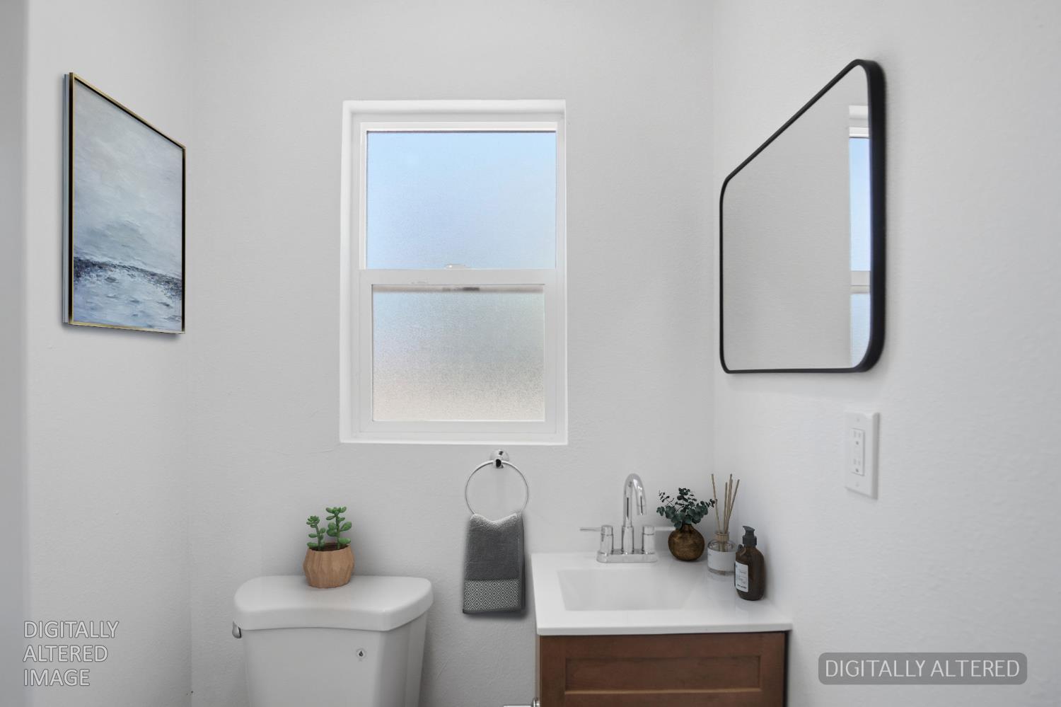 1451 Kent Way Modesto, CA 95355 - Photo 30 of 37 a bathroom with a sink and a mirror