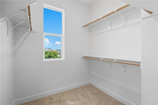 a view of an empty walk in closet