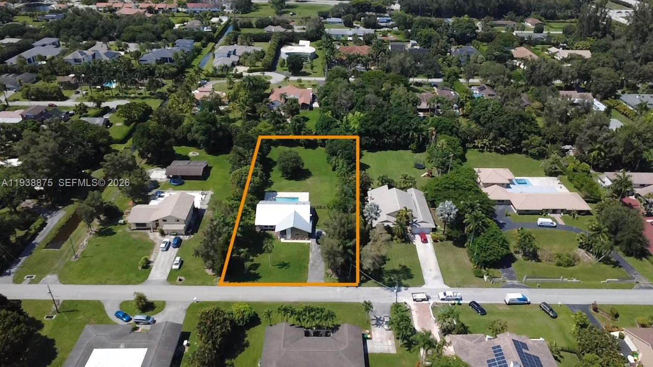 11501 Southwest 3rd Street Plantation, FL 33325 - Photo 1 of 16 an aerial view of multiple houses with yard