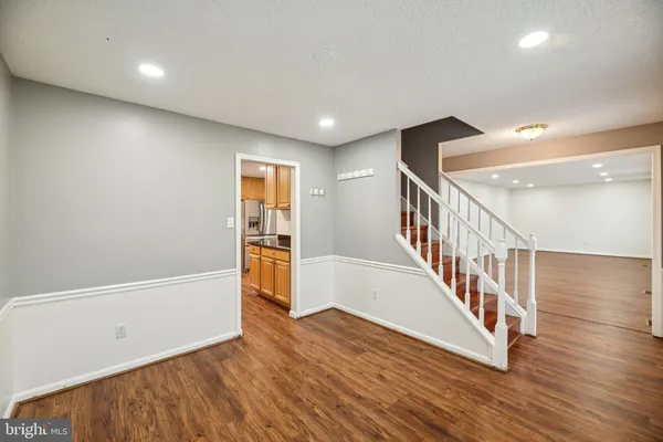 a view of entryway with wooden floor