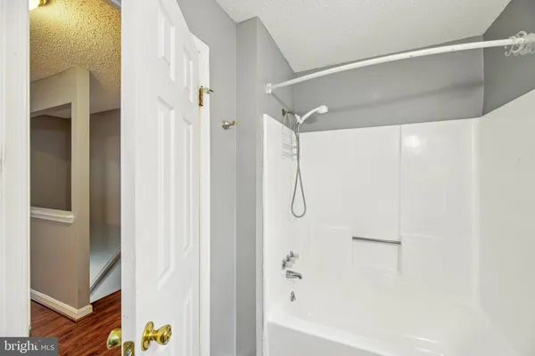 a view of balcony with wooden floor