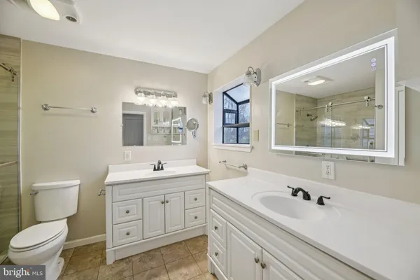 a view of a house with a yard and garage