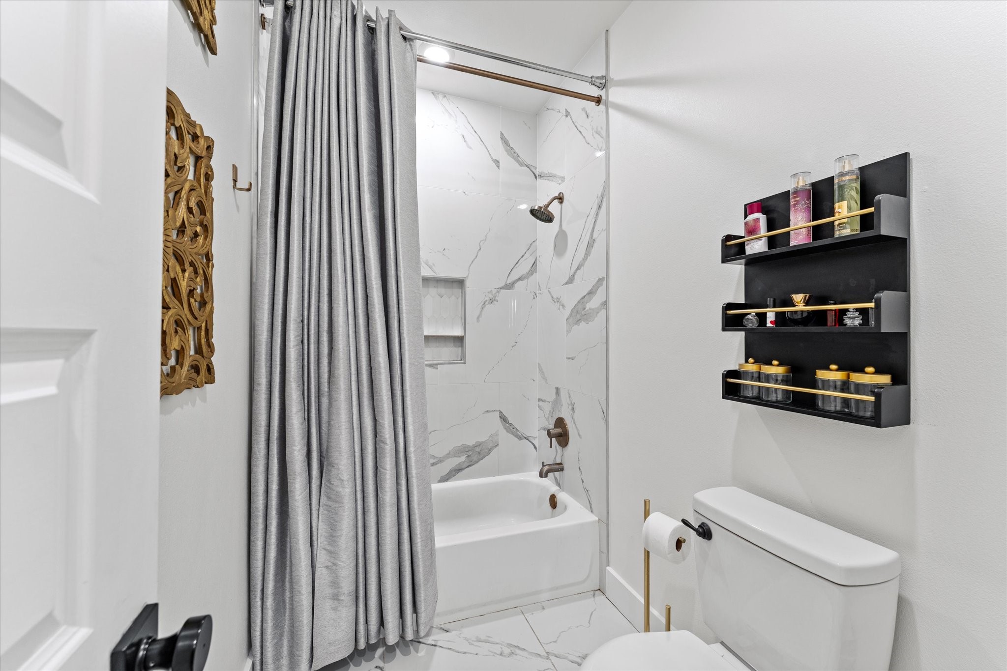 4627 County Road 63 Rosharon, TX 77583 - Photo 22 of 34 a bathroom with a shower a toilet and a shower curtain