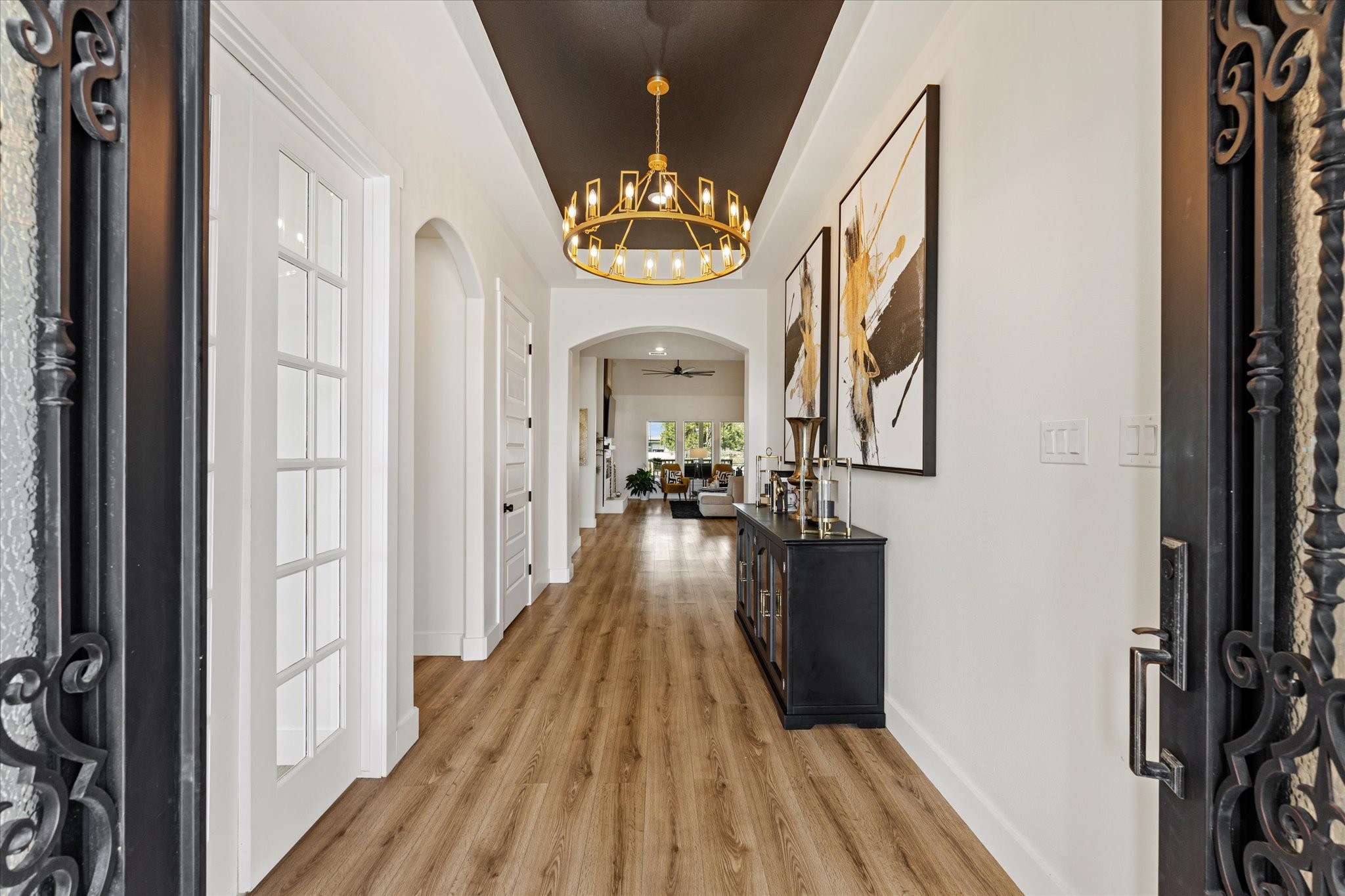 4627 County Road 63 Rosharon, TX 77583 - Photo 4 of 34 a view of a hallway view with wooden floor and staircase