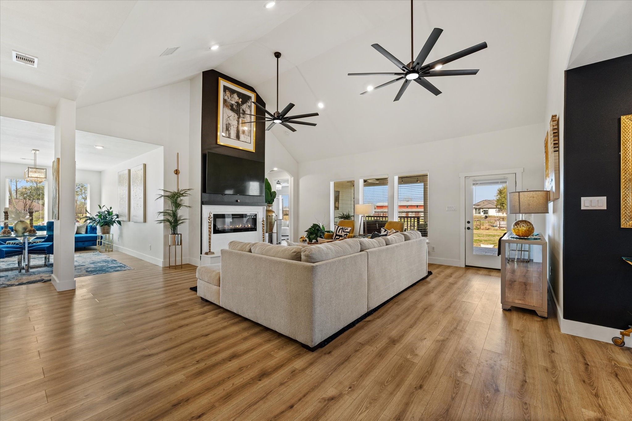 4627 County Road 63 Rosharon, TX 77583 - Photo 33 of 34 a living room with furniture and a wooden floor