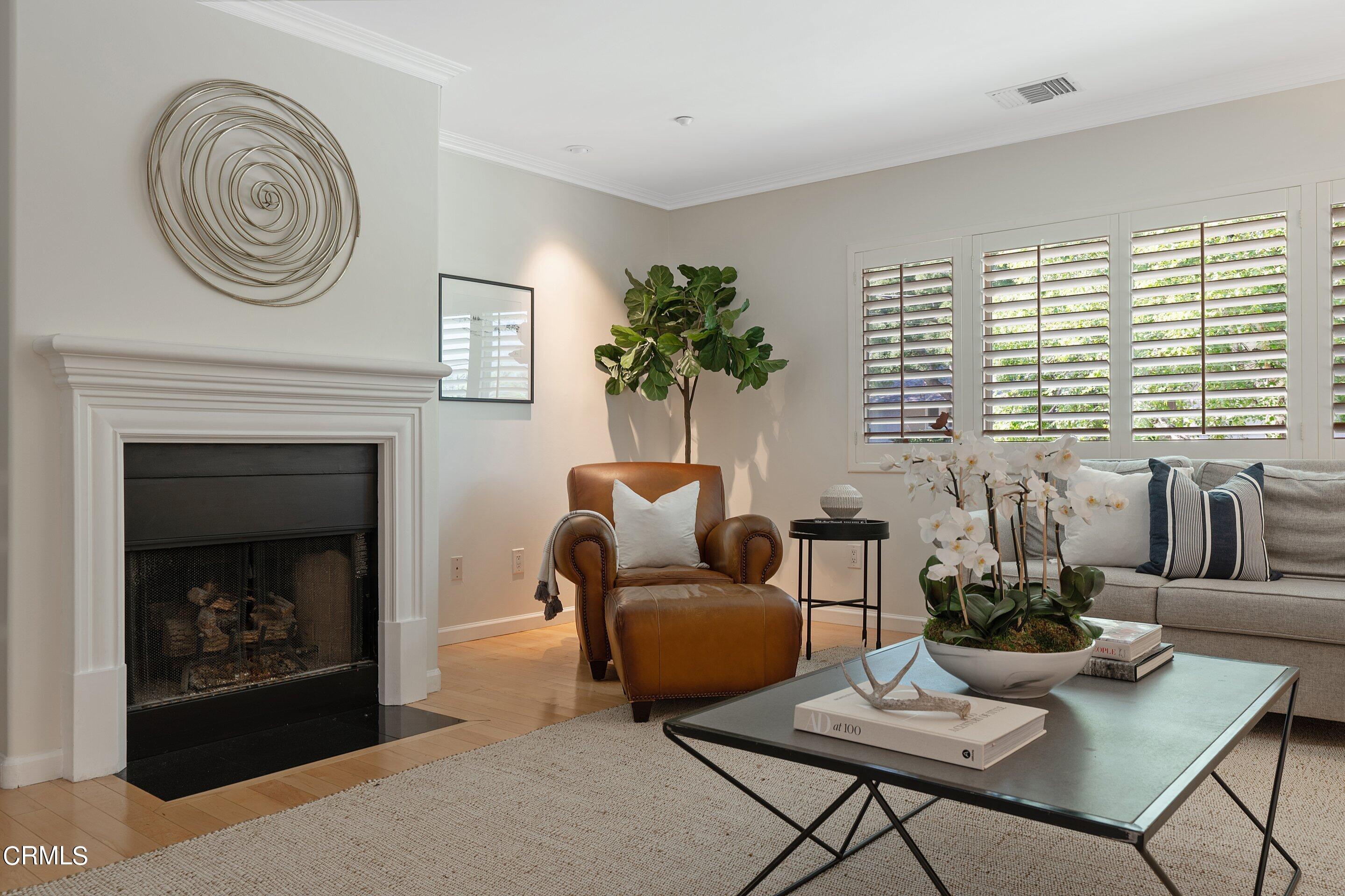 3710 Cedarbend Drive La Crescenta, CA 91214 - Photo 14 of 73 a living room with furniture and a fireplace