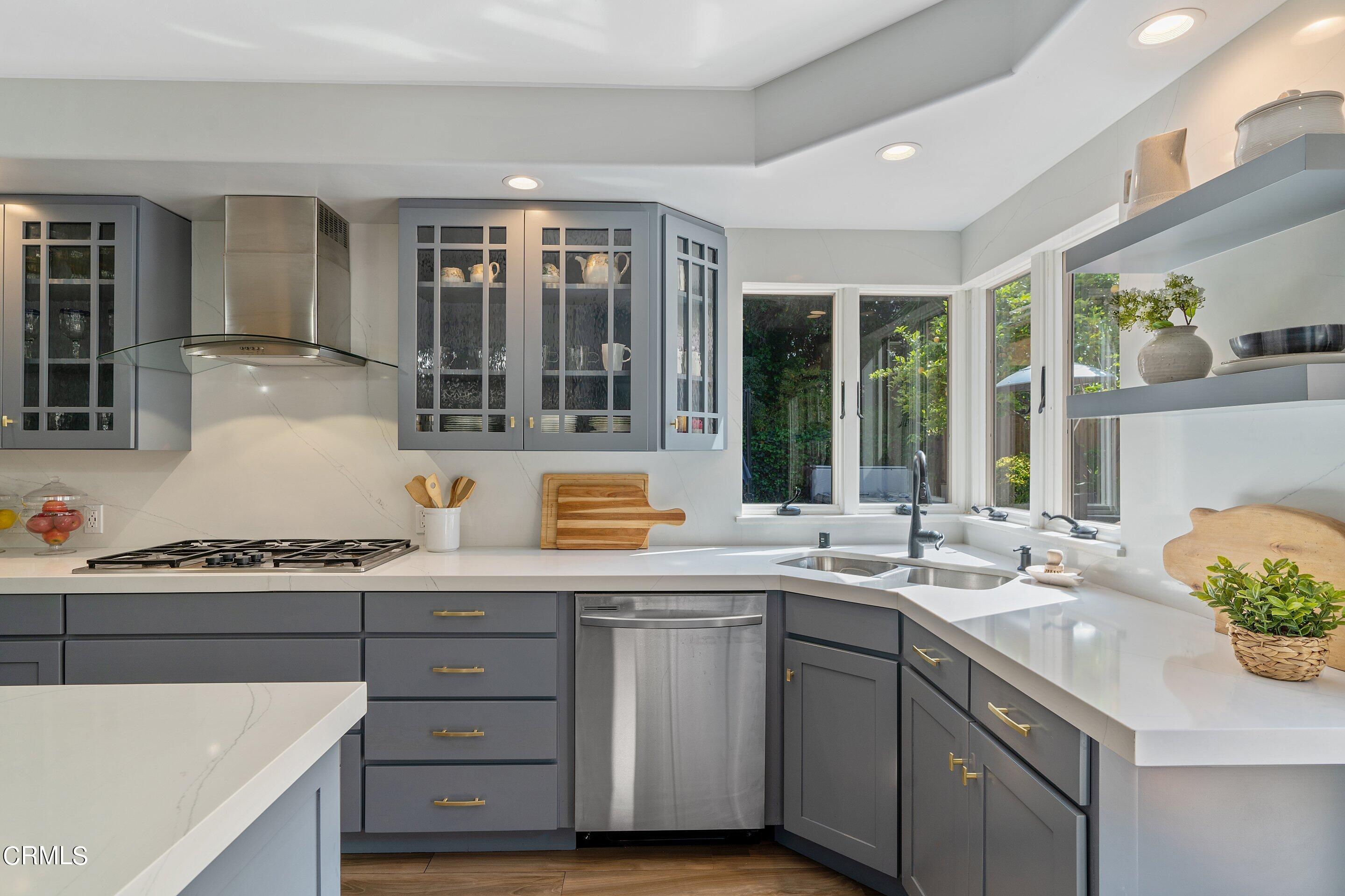 3710 Cedarbend Drive La Crescenta, CA 91214 - Photo 19 of 73 a kitchen with a sink stove and cabinets
