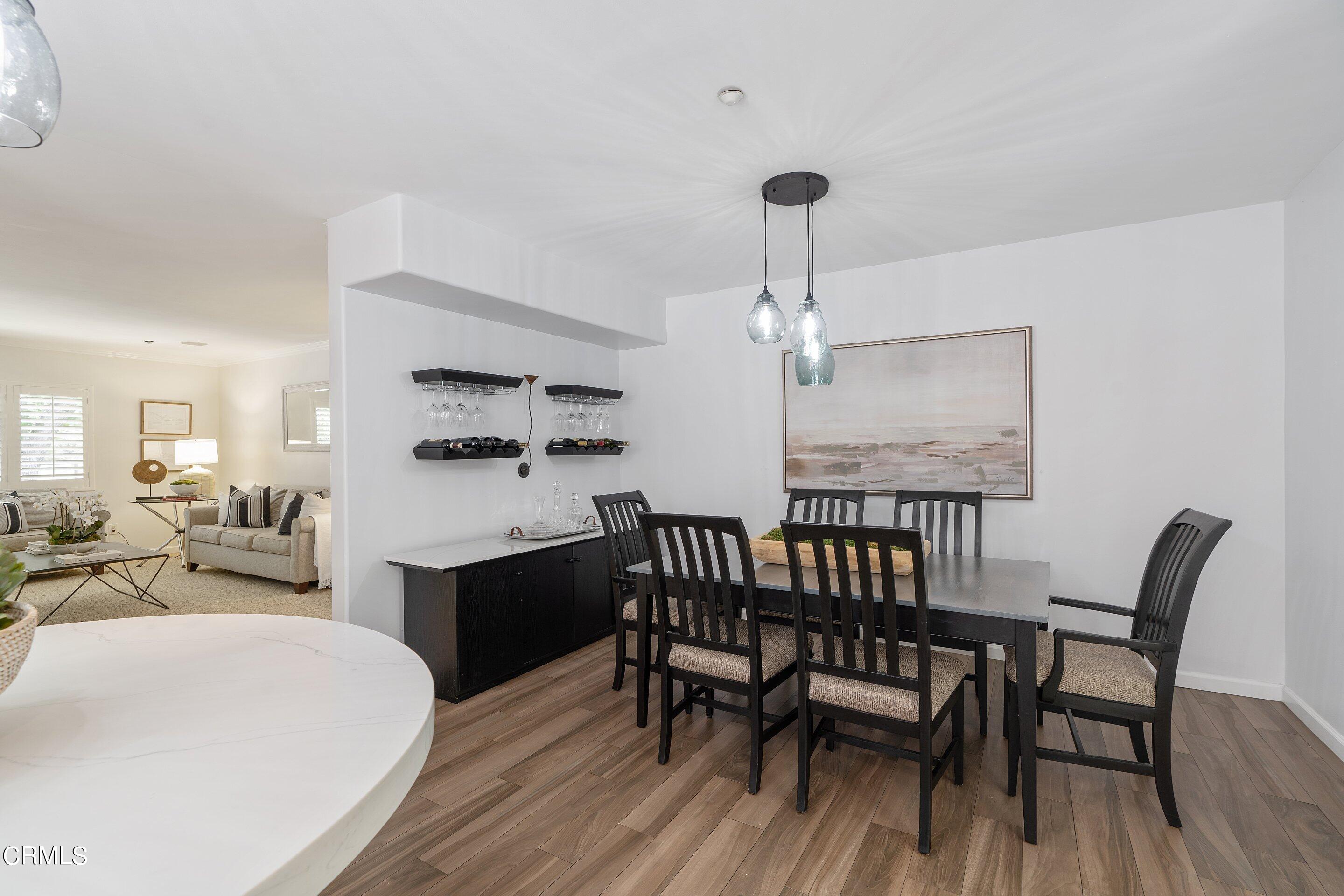 3710 Cedarbend Drive La Crescenta, CA 91214 - Photo 24 of 73 a view of a dining room with furniture window and wooden floor