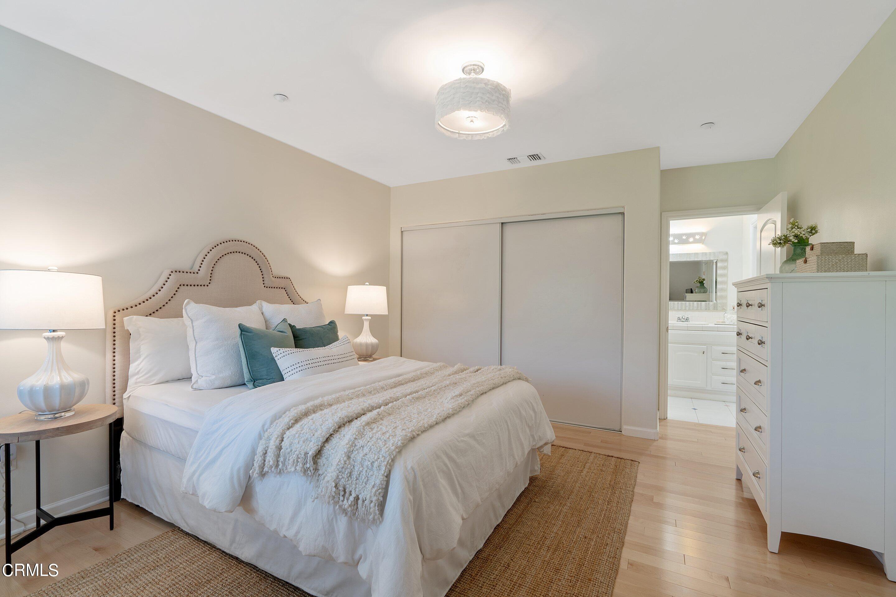 3710 Cedarbend Drive La Crescenta, CA 91214 - Photo 43 of 73 a bedroom with a bed and a lamp