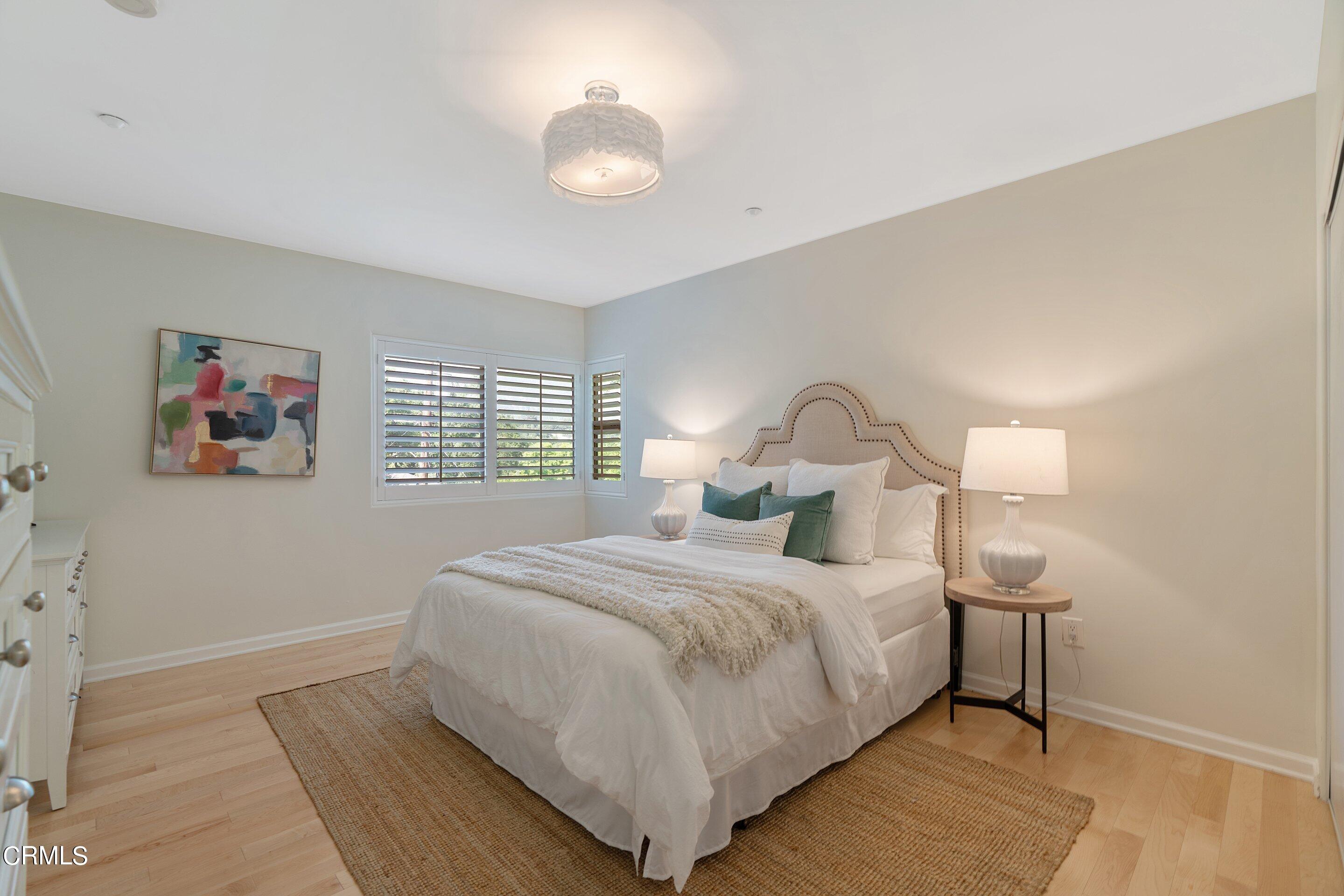 3710 Cedarbend Drive La Crescenta, CA 91214 - Photo 44 of 73 a bedroom with a bed and a painting on the wall