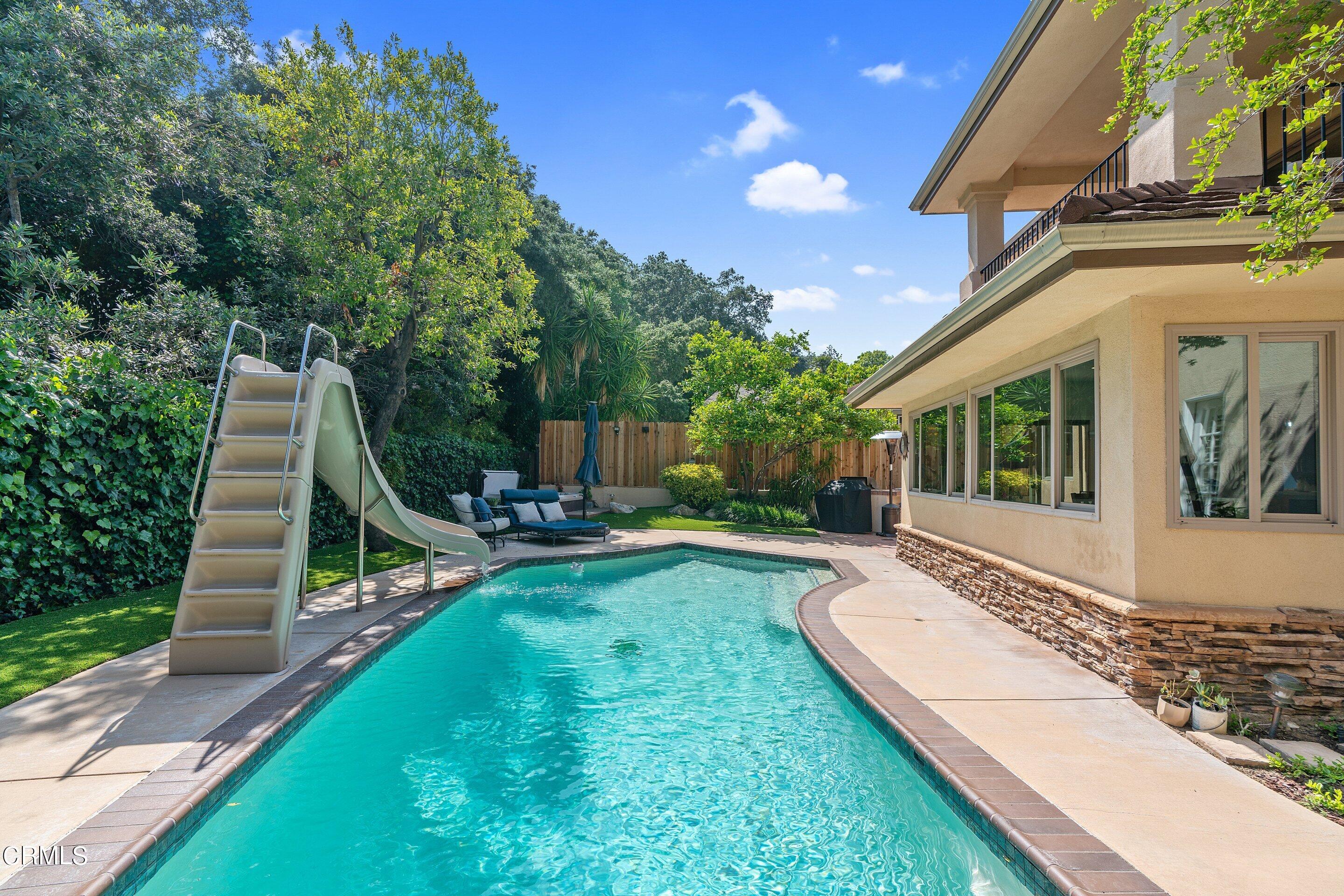 3710 Cedarbend Drive La Crescenta, CA 91214 - Photo 62 of 73 a view of a house with backyard sitting area and garden