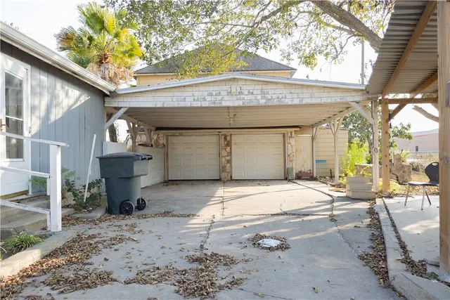 a front view of a house with a garage