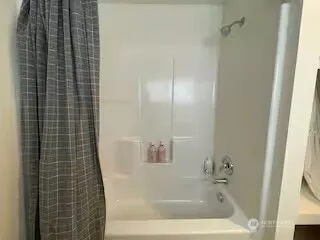 a bathroom with a bathtub