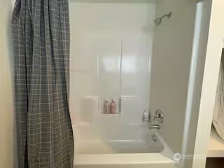 219 East Main Mossyrock, WA 98564 - Photo 14 of 28 a bathroom with a bathtub