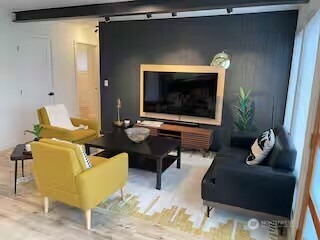 219 East Main Mossyrock, WA 98564 - Photo 5 of 28 a living room with furniture and a fireplace