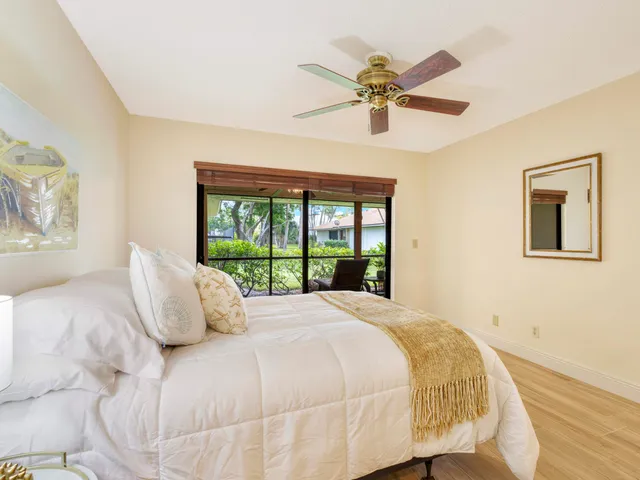 a kitchen with a sink appliances and cabinets