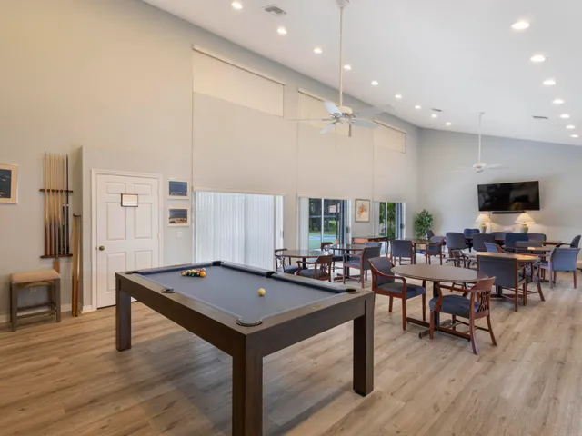 a view of a swimming pool with a patio