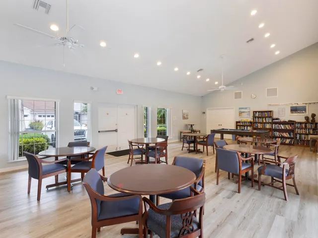 a view of a lake with houses in the back