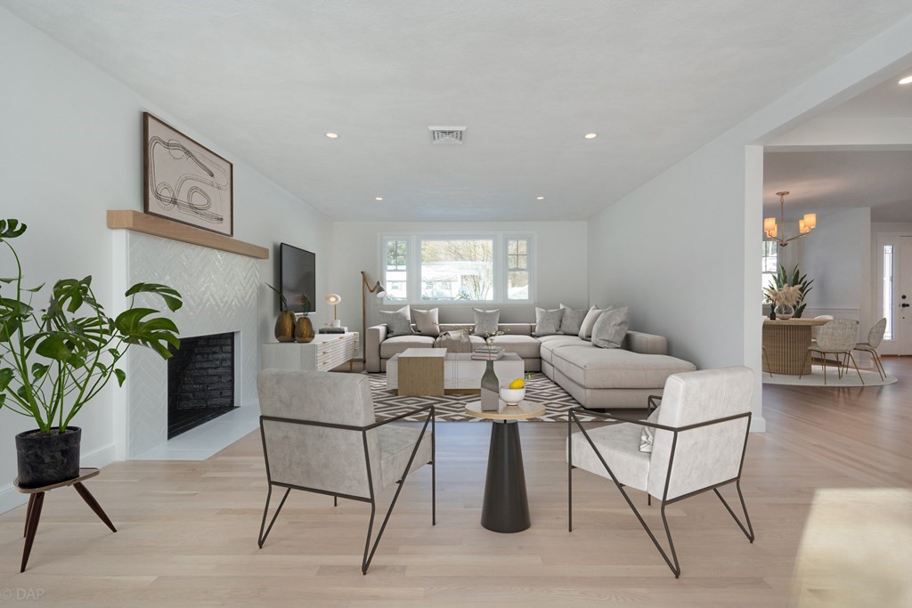 143 Hillcrest Road Concord, MA 01742 - Photo 18 of 42 a dining room with furniture and a potted plant