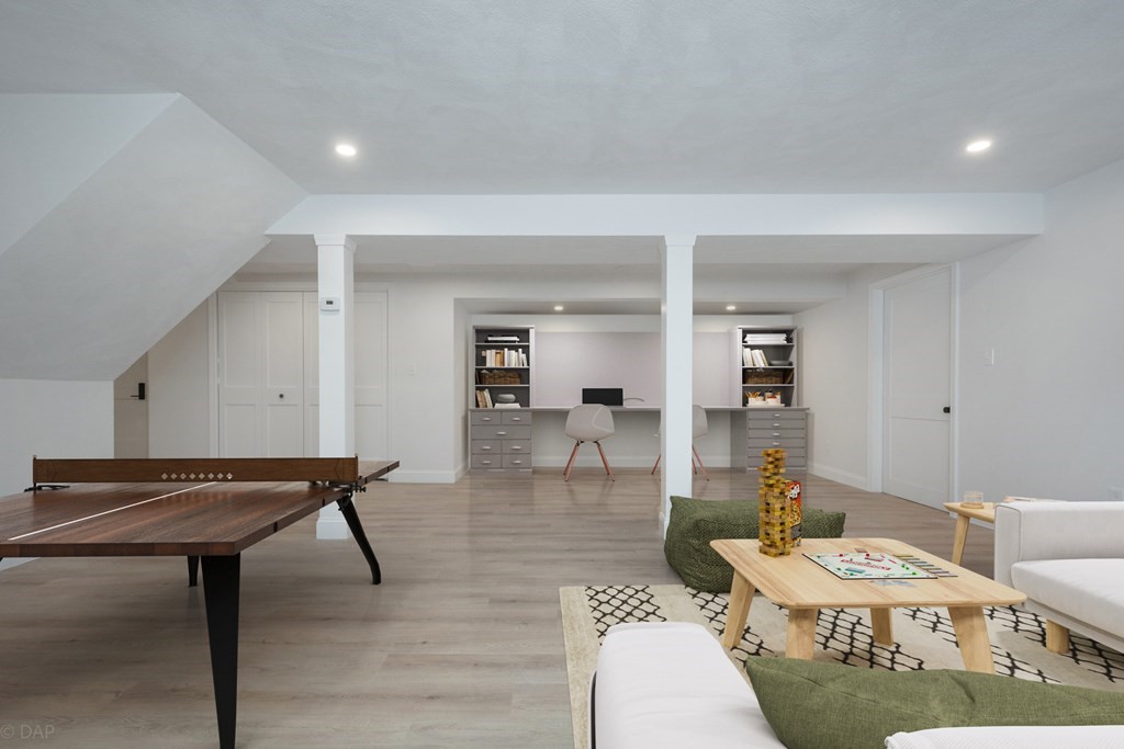 143 Hillcrest Road Concord, MA 01742 - Photo 35 of 42 a living room with furniture and a table