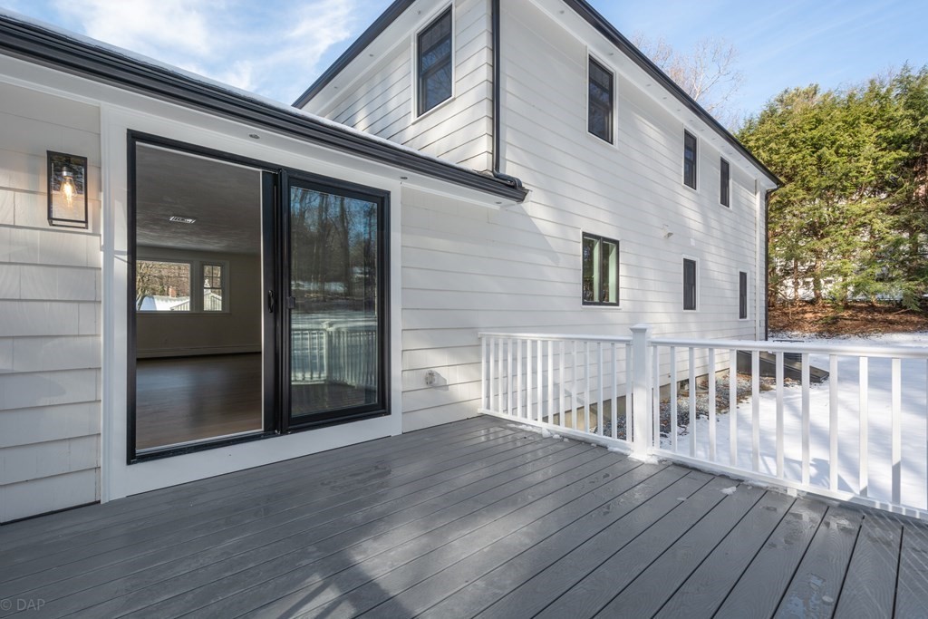 143 Hillcrest Road Concord, MA 01742 - Photo 36 of 42 a view of a house with wooden floor